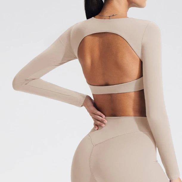 Women's long-sleeved yoga top with built-in breast pads, breathable and comfortable, suitable for gym workouts and fitness. Aurexia off