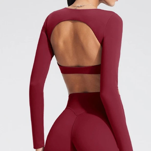 Women's long-sleeved yoga top with built-in breast pads, breathable and comfortable, suitable for gym workouts and fitness. Aurexia off