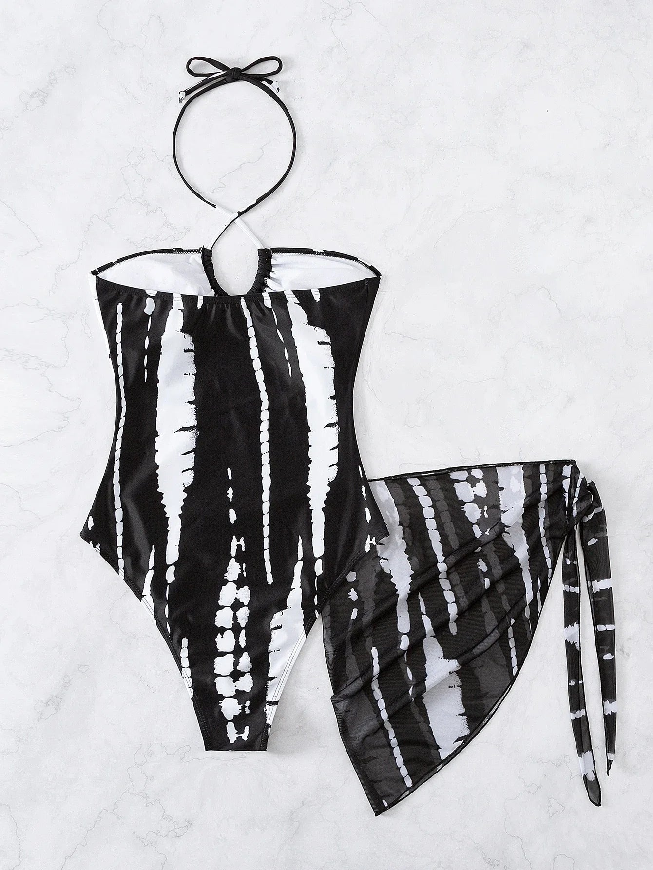 Abstract Black White Tie Dye Halter One Piece With Cutout Detail And Sheer Wrap Skirt Aurexia off